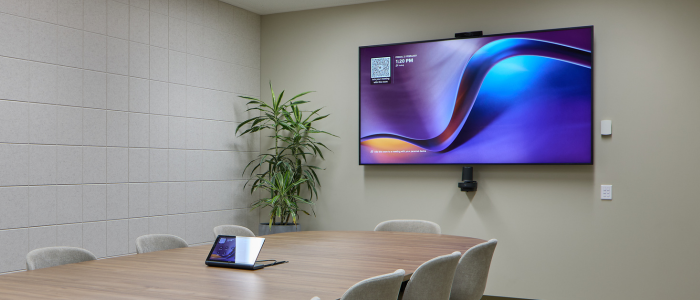 Commercial project conference room with AV technology and digital display installation.