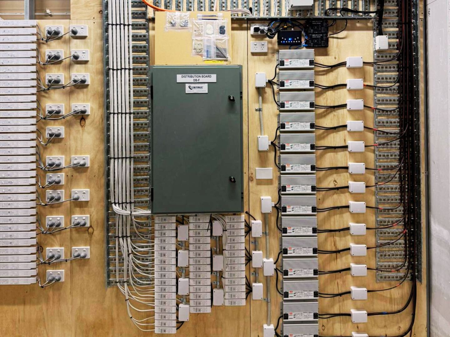 Electrical data, power and lighting board installation at Tiffany & Co. Burnside Village by Keece SA
